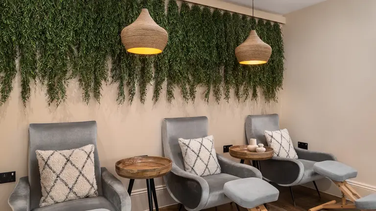 Three armchairs in a nail bar