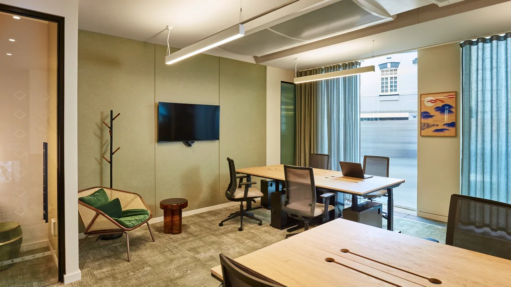 Private office with desks and telephone booth