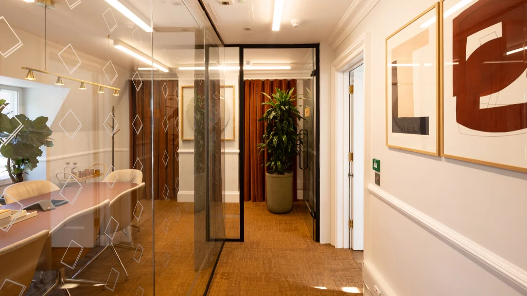 Corridor with paintings on the wall