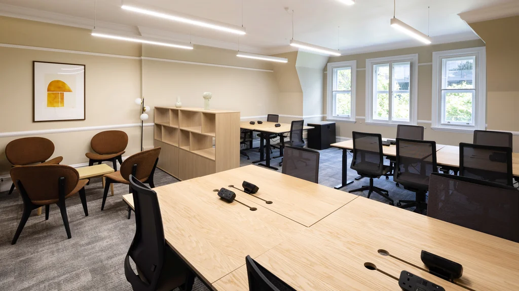 Interior of an office with desks and chairs