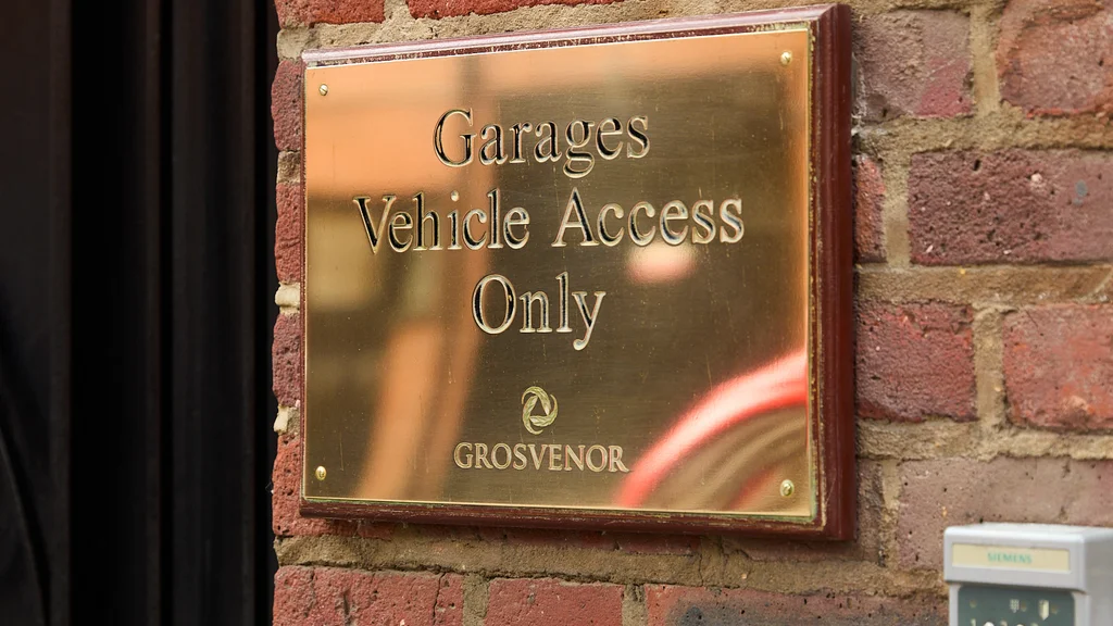A sign that says Garages Vehicle Access Only 