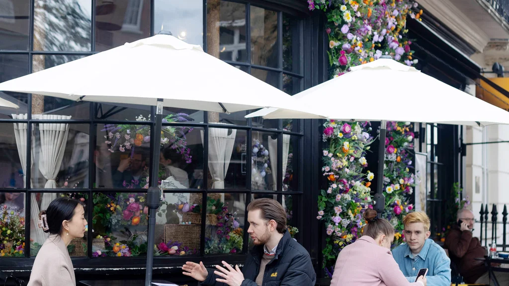 People sitting outside a cafe