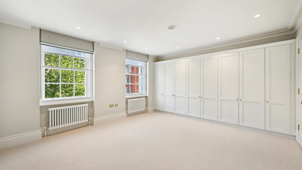 Bedroom with built-in wardrobes