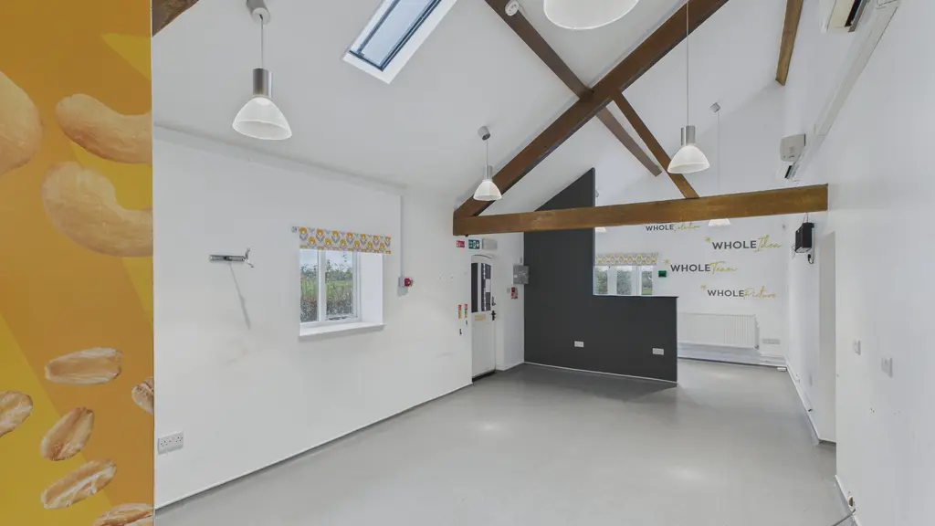 Empty room with ceiling beams