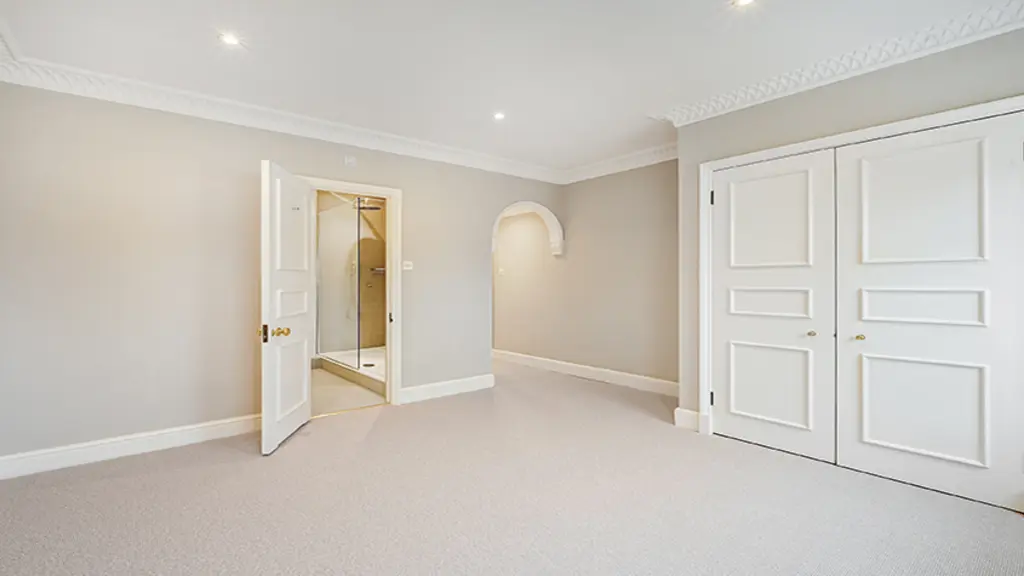 Empty bedroom with built-in storage 