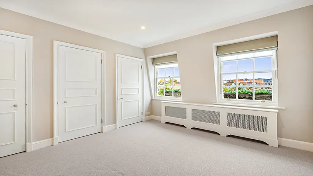 Bedroom with two windows 