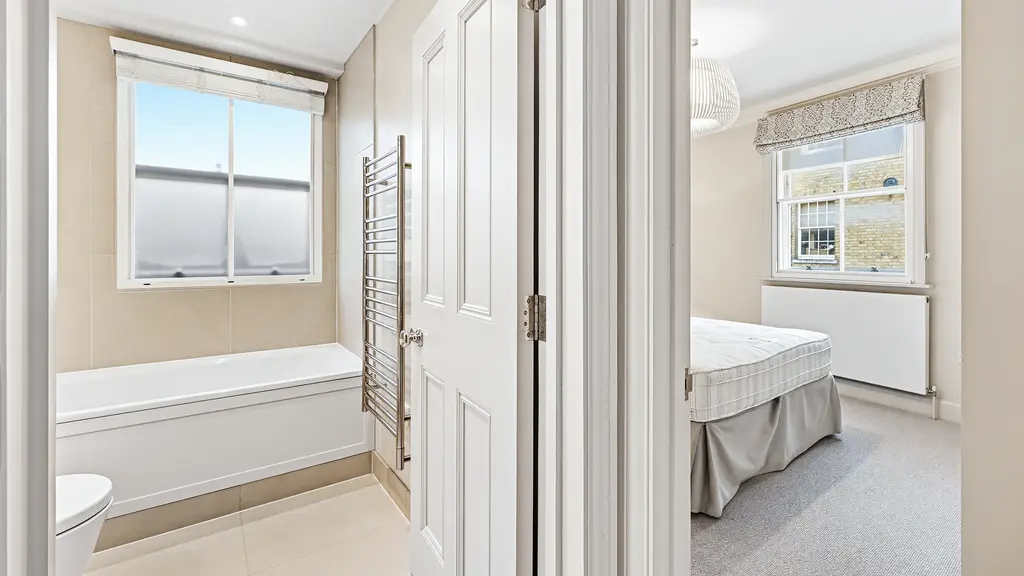 Doors leading into bathroom and bedroom