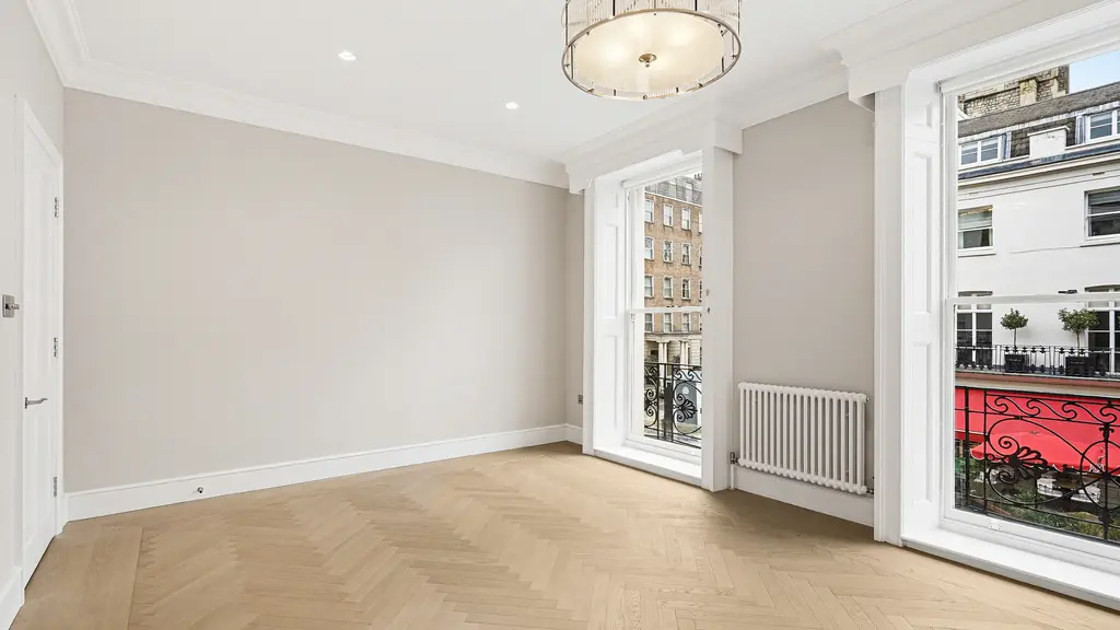 Empty room with two windows 