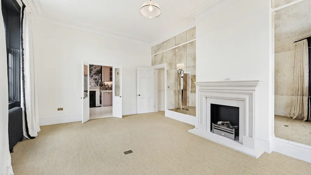 Empty room with a fireplace