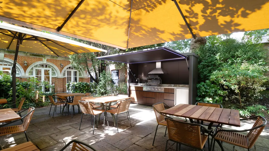 Barbecue and tables and chairs 
