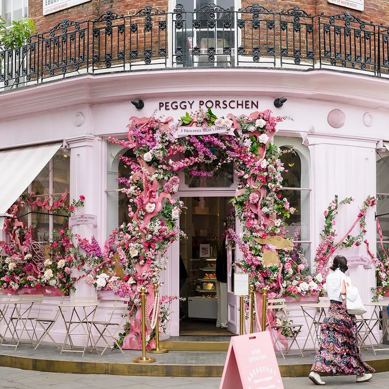 Outside of Peggy Porschen with a floral archway